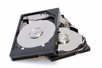 two hard drives stacked on top of eachother