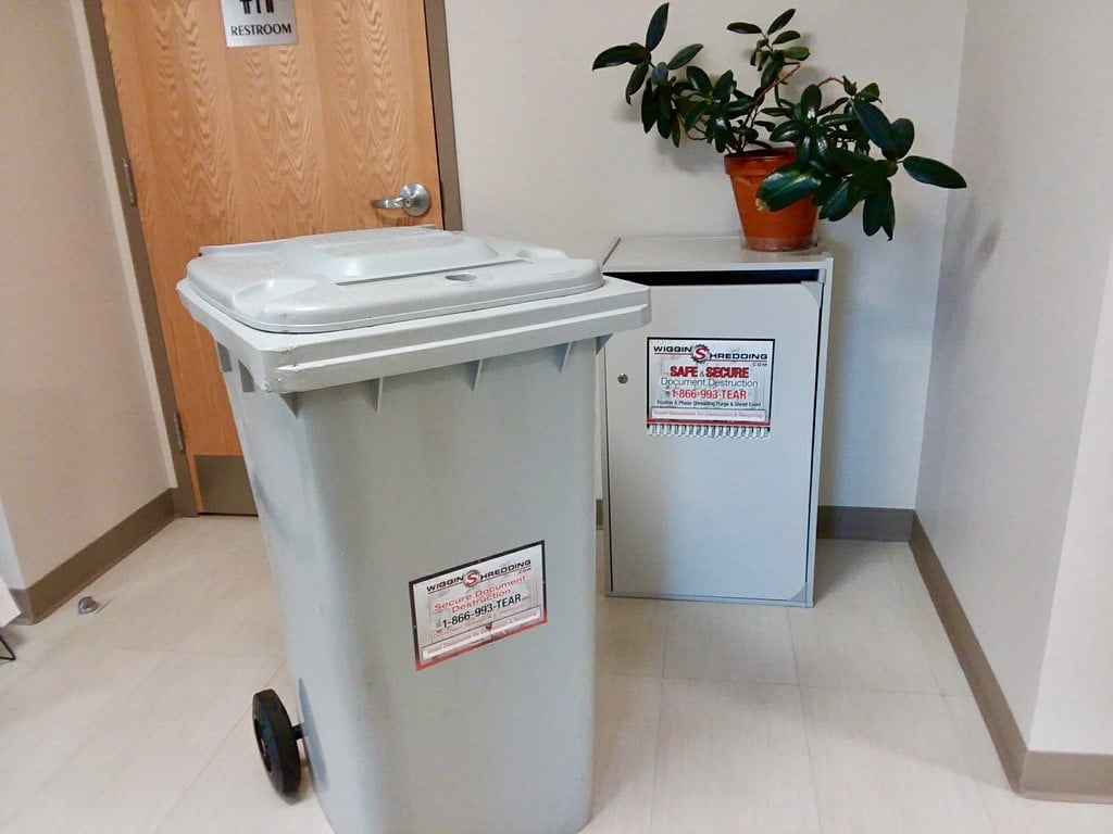 Two different kinds of Secure Collection Containers for Materials needing to be shred.