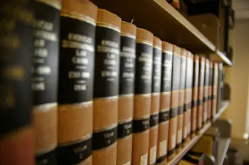 Close Up of a bookshelf filled with Law books
