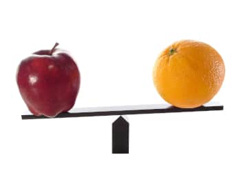 an Apple and an Orange Balanced on a Scale