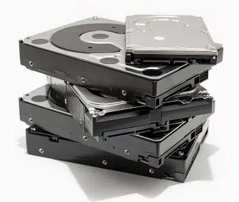 A pile of hard disk drives HDD isolated on white background.
