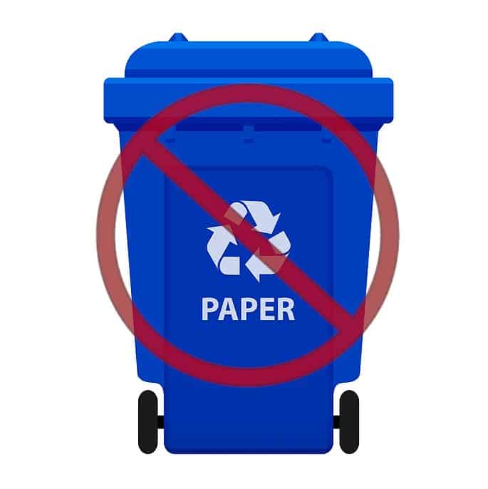A Blue Recycling Bin with a Red Do Not Use Shape Overlaid