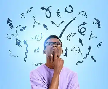 A young man in a purple shirt appears to be pondering while holding his finger to his mouth. On the blue background, black doodle-style arrows are pointing in all directions.